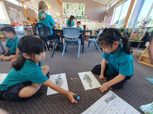 Alesha and Corrine playing 'Murtles 5 and...'