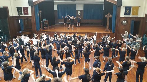 The Junior School and teachers enjoying Jump Jam