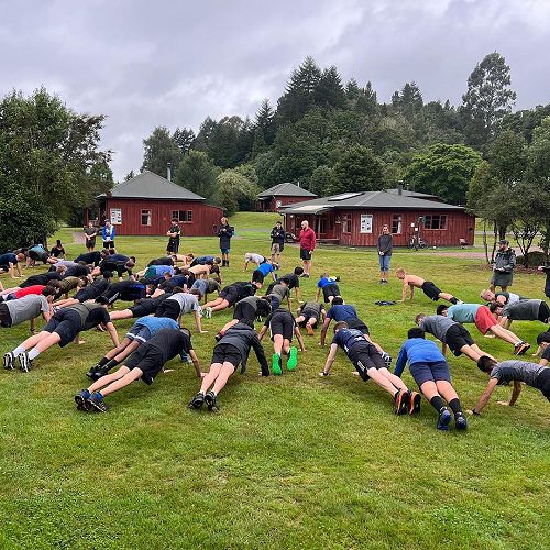 Group planking at Tihoi Venture School