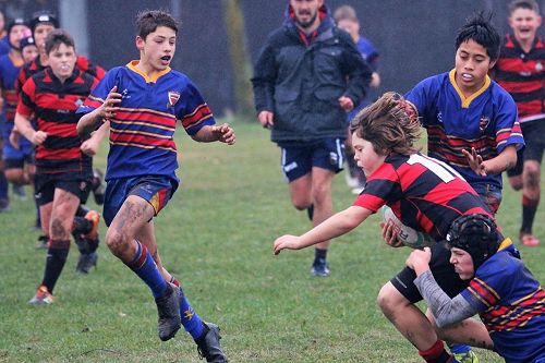 JOSM On the right, justifiably fending off the St Bedes player, is our youngest form class member William (Tizzy) Fetokai