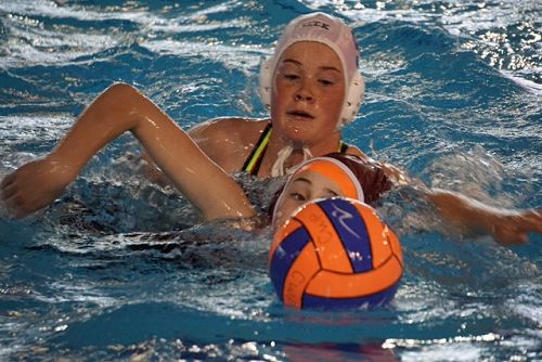 Billie-Rose going for the ball. Great defending. 