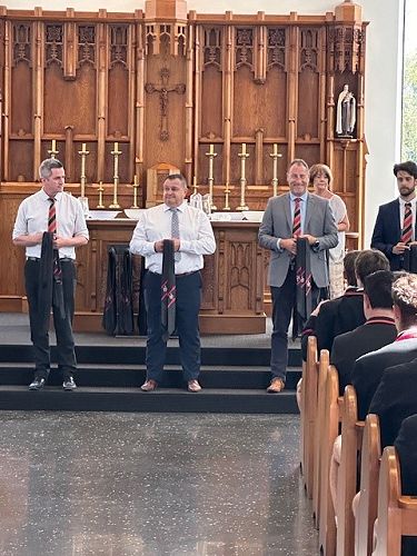 Current staff members and old boys of the college present the Year 13s with their ties. From left, Mr Matthew Grueber, Mr Simon Cooper, Mr Chris Hubble and Mr Aaron Poulter.