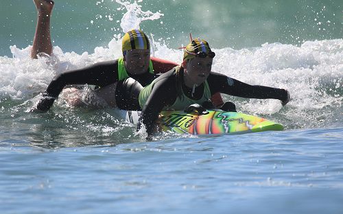 Sisters Amelia and Madi showing their strength