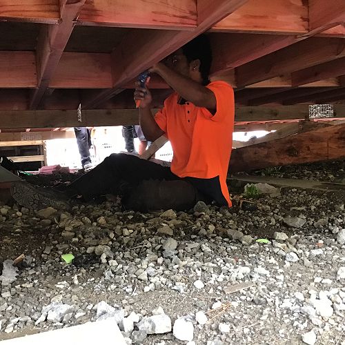 Markus working under the house