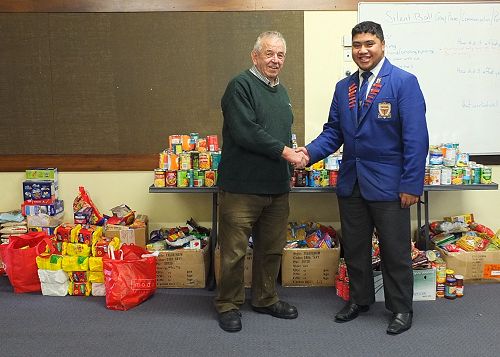Rice - food can drive presentation to St Vincent De Paul