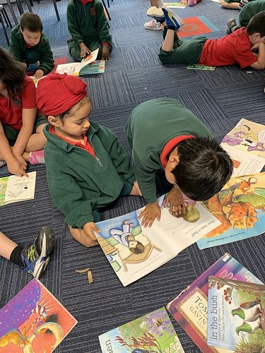 Surkhab has just started schoo but is already a focused reader.