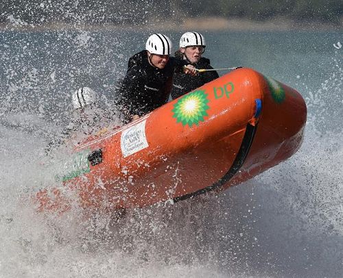 Mia Stout (centre) riding high on the waves