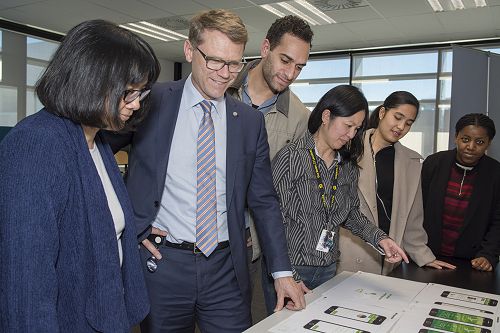 Shift students explaining their project to Ministe