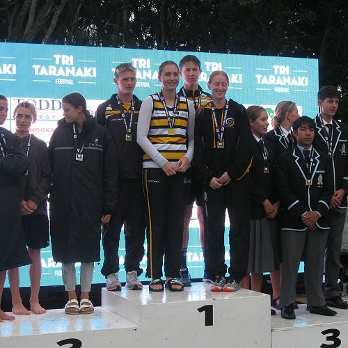 Oliver Larcombe, Toby Finlayson, Nikita Coleman and Monique Speeding (from HGHS) at the podium for their U19 mixed relay.