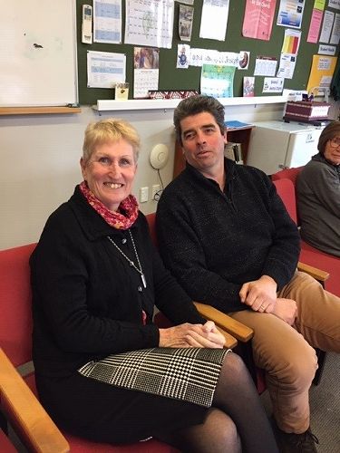 Mrs Sloane and Mr Johnson catching up over morning tea.