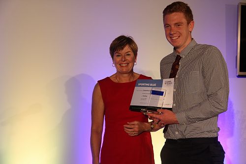 Chief Operating Officer Philippa Jones presents Lawrence Darling with his Lincoln University Blue for Hockey 