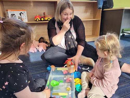 Playgroup Sarah de Heer plays Mr Potato Head with Sadie Houston and Charlotte Oliver