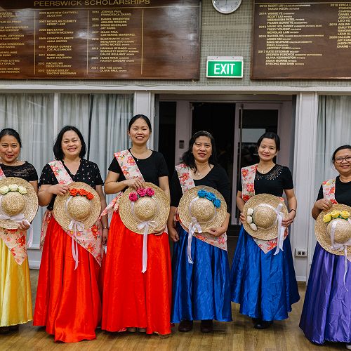 Mums getting ready for the traditional dance presentation.