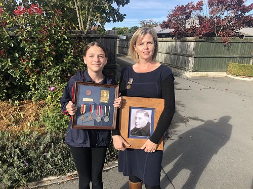 Phoebe carried her framed Great Grandad's medals and dog tags. I carried a photo of my Great Uncle who served in the NZRAF.