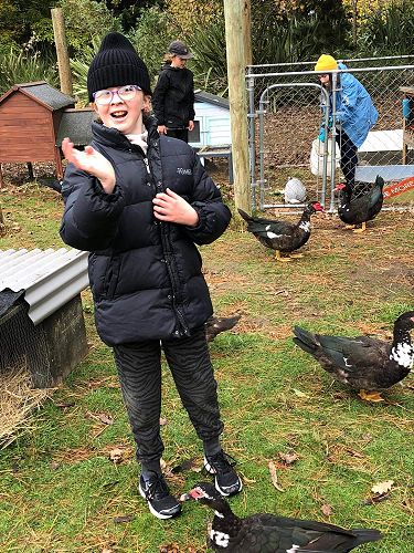 Chelsey enjoys her time out with the animals. She is rugged up really well for the cold weather.