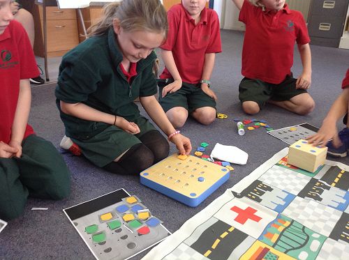 Katie is creating a code for her robot to follow