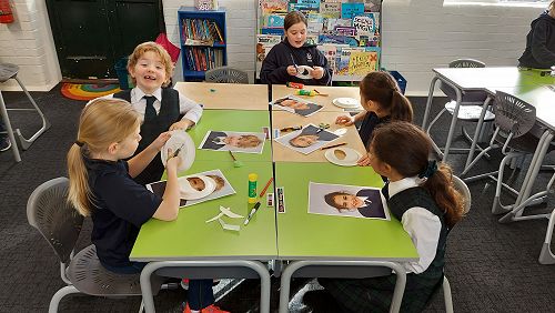 Students creating their astronaut