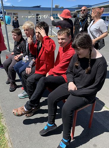 Room 10 students waiting for their turn with the dunk tank. 