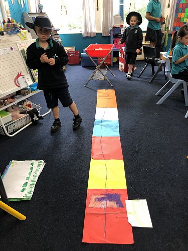 This is Theo's interpretation of an experience. There was a leak in a water pipe at school. He has drawn a visual representation of it.