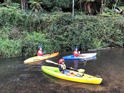 Happy Konini kids enjoying kayaking