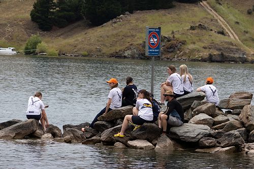 Waiting for the races to come past