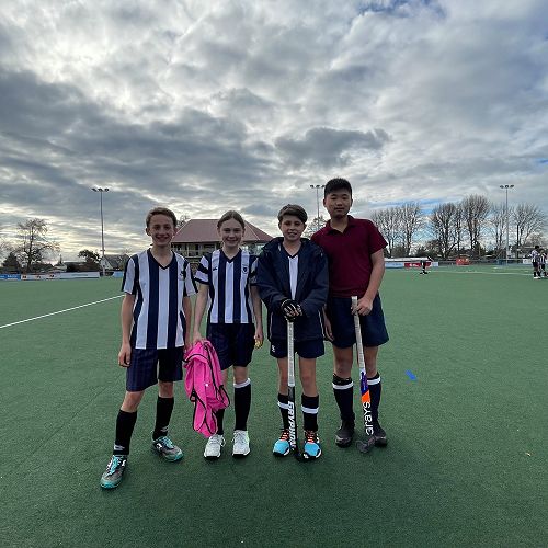 Hockey players line up