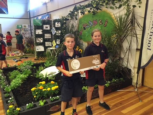 Nate and Penny with the GOLD award!