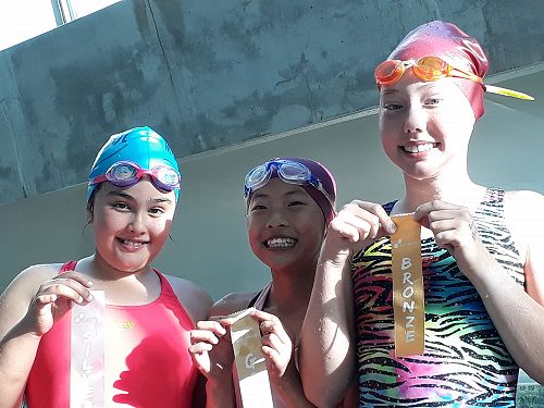 Mariam, Hebe and Ayala sharing their success at the pool on Tuesday.