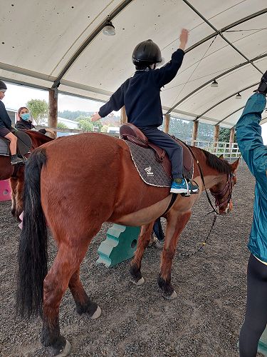 Samuel having fun at Riding for Disabled (RDA)