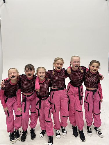 Charlotte and Maia with team mates - Imperfectly Perfect