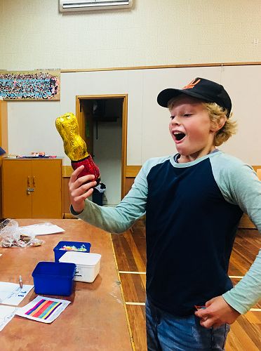 Kayden wins the grand prize of a chocolate bunny at the Easter Treasure Hunt