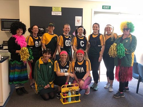Staff along with cheer leaders get ready to verse our Senior A netball team. 