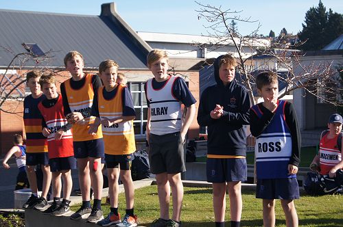 Y7&8 students cheer for older students at the finish line