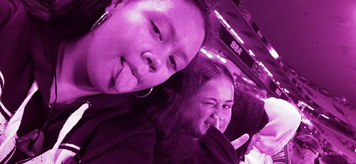 Mercedies and Catherine waiting for the Blues to take the field at Eden Park