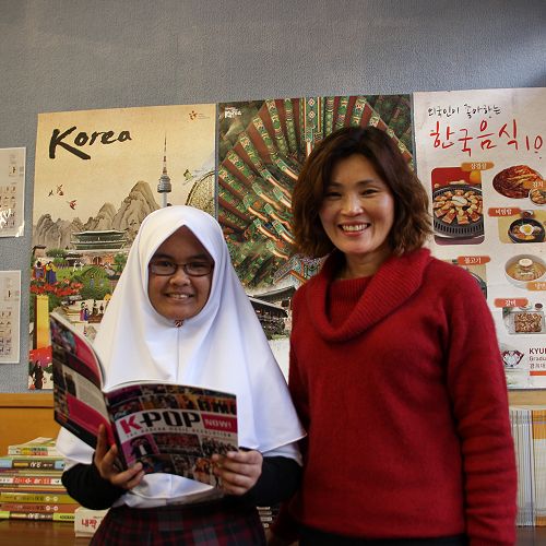 Scholarship winner and teacher