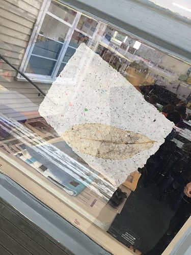 A piece of their recycled paper.