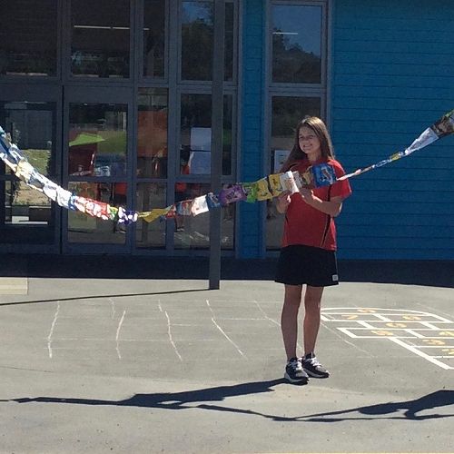 Enviro Group children show the number of chip packets collected in only one day! 
