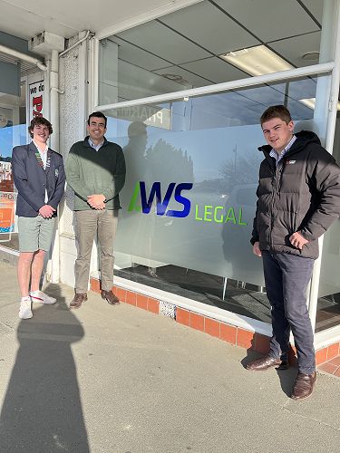 Chris Menzies from AWS Legal with 1st XV players Max Treloar and Blake Adams.