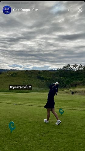 Sophia completing a tee off