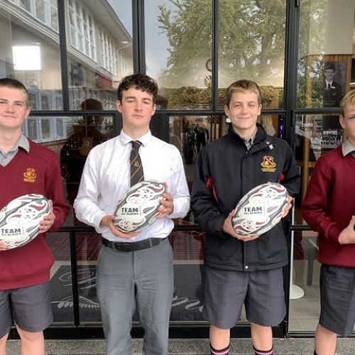 The recipients of the Dan Carter rugby balls, from left to right: Jack Anderson, George Unsworth, Charlie Hawke, and Jackson Botherway.