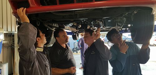Declan, Jacob and Tapu - under the car