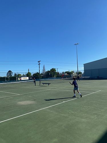 Benny on the serve. Smash it!