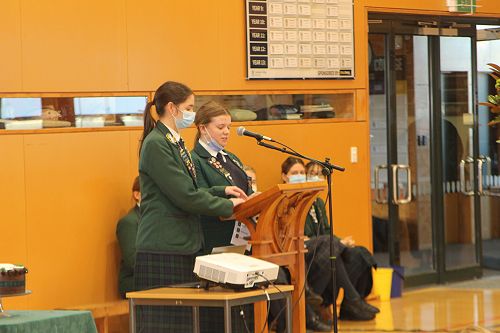 Elyse Davey and Emma McDonald lead us in the opening prayer