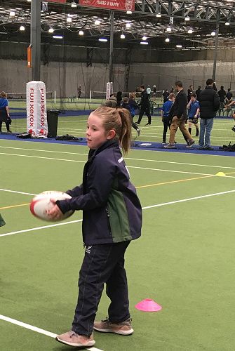 Lily Cuthbertson taking part in Rugby drills
