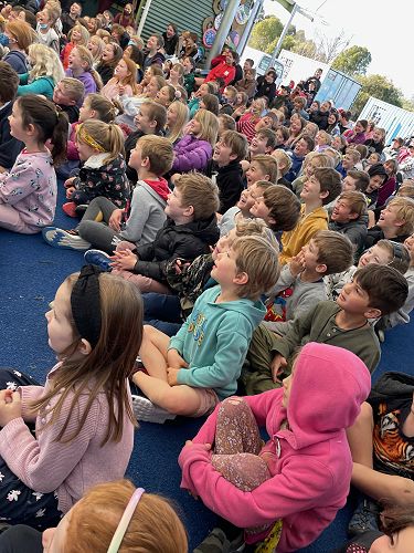 The audience looks on with delight!