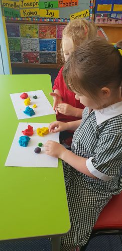 Mixing colours with playdough