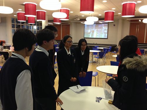 (Left to right) Jed Song, Louis Kang and Josh Chung confer with their team mates during one of the challenges during the amazing race.