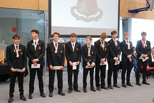 Our champion Under 18 Rowing Eight at the Celebration Assembly, receiving their National Honours badges