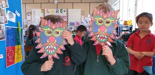 In the role play space, Harri and Jesse created a dragon mask.