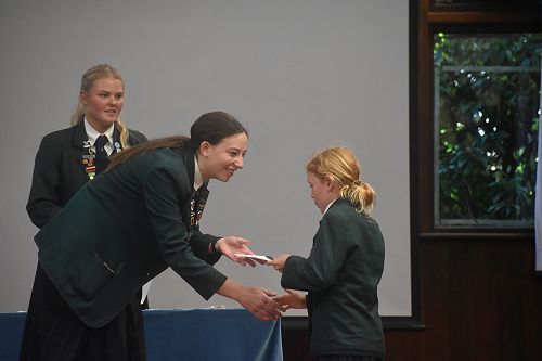 Junior School Prefect Grace presenting to Emerson
